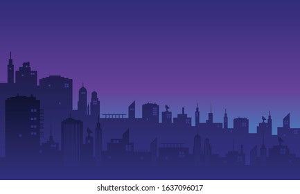 Silhouette of a city at night with many buildings 