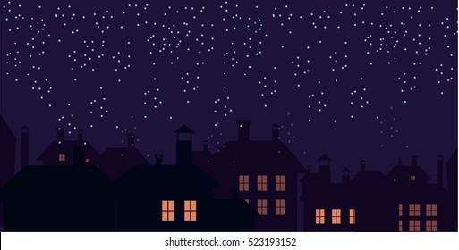 Silhouette of the city and night sky. Falling snow. Cat on the roof.