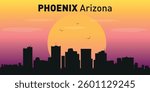 Silhouette of the city of Phoenix, Arizona against the backdrop of a picturesque sunset.