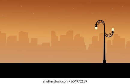 Silhouette of city with street lamp style scenery