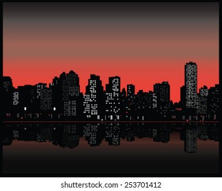 Silhouette of city at sunset