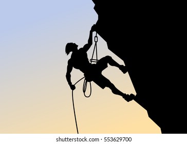 silhouette of a climber on sunset background