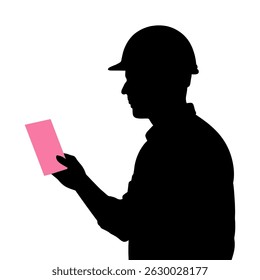 Silhouette of construction worker reading plans wearing hard hat for building and architecture project