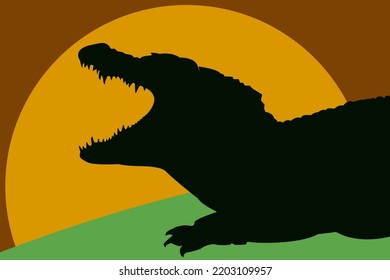 Silhouette, contour of a crocodile against the background of sunrise or sunset