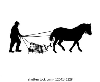 Silhouette of country man plowing by horse.