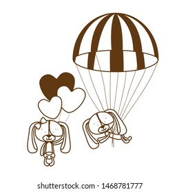 silhouette of couple of cute puppies on parachutes