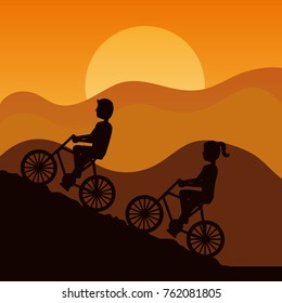 silhouette of couple driving bike climbing mountain with sky at sunset