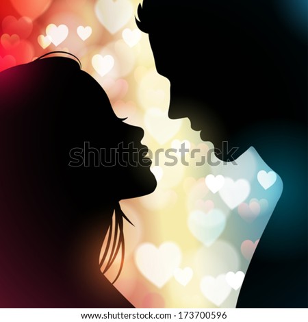 Silhouette of a couple facing each other with hearts in the background