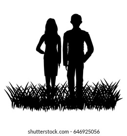 silhouette of a couple in a field grass image