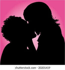 Silhouette of couple kissing