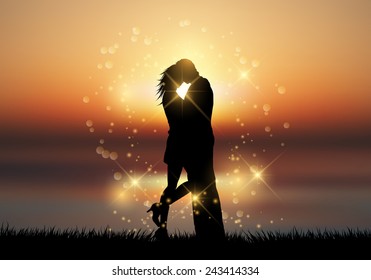 Silhouette of a couple kissing against a sunset sky