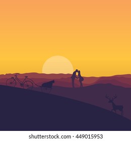 silhouette of couple kissing in sunset dramatic color 