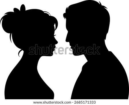 Silhouette of a couple looking at each other in love