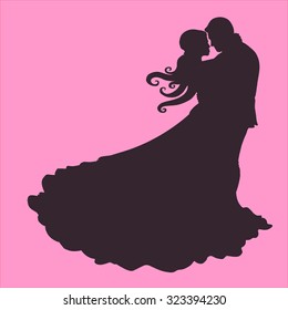 silhouette of a couple in love hugging Rose