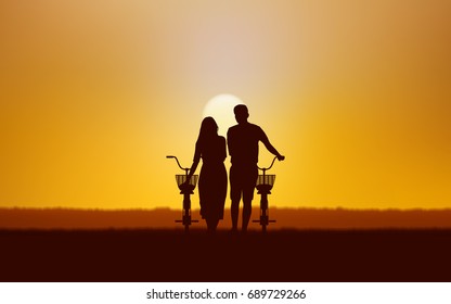 Silhouette couple man and woman walking together with bicycle under sunset sky background
