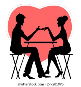 Silhouette of couple in cafÃ© on the background with red heat