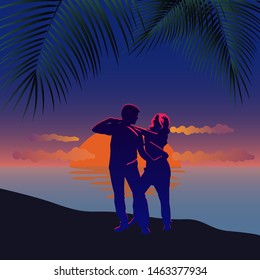 Silhouette of couple on beach at sunset.Young couple dance salsa. Dancers on the sand at summer dusk.