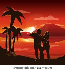 Silhouette of couple on beach at sunset.Young couple dance salsa. Dancers on the sand at summer dusk.