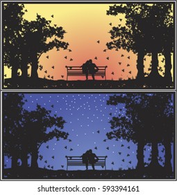 silhouette of a couple sitting on a bench embraced at sunset and at night in a park in autumn looking at the sky