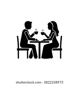 A silhouette of a couple sitting at a table and drinking coffee