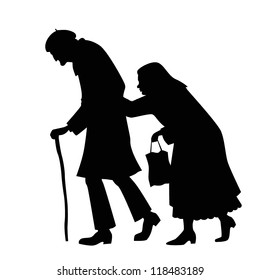 Silhouette Of Couple Walking Old Man With A Cane And An Old Woman With A Bag