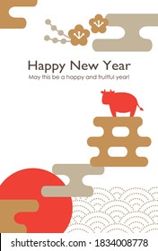 Silhouette of cow on the kanji of year of the ox  with first sunrise