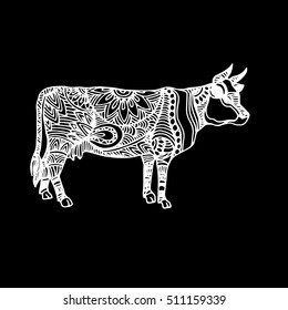 Silhouette of a cow with patterns and ethnic ornaments, ornaments of ancient tribes and peoples of India.