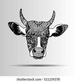 Silhouette of a cow with patterns and ethnic ornaments, ornaments of ancient tribes and peoples of India.