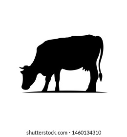 Silhouette of a cow. Vector flat illustration on white background.