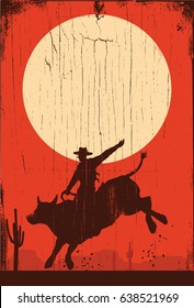 Silhouette of a cowboy riding bull at sunset on a wooden sign, vector