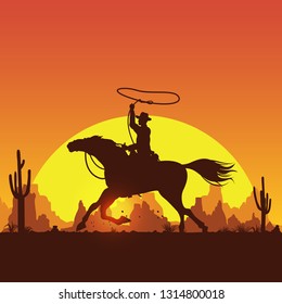 Silhouette of a cowboy riding horse at sunset