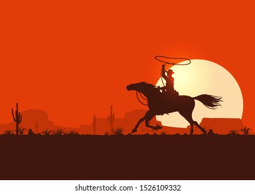 Silhouette of a cowboy riding horse at sunset