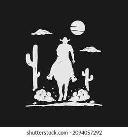Silhouette Of A Cowboy Riding The Horse To The Sunset