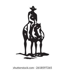 Silhouette of cowboy riding stallion 