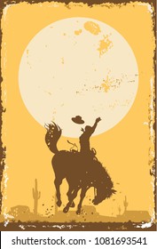 Silhouette of a cowboy riding a wild horse at sunset on a tin sign, vector