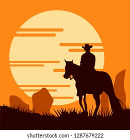 silhouette cowboy with sunset