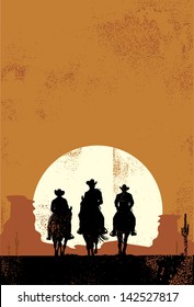 Silhouette of cowboys at sunset in grunge style