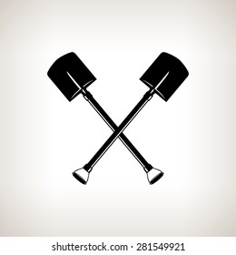 Silhouette of  Crossed Shovels on  Light Background, a Tool for Digging,Black and White Vector Illustration