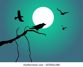 silhouette of crows on a branch