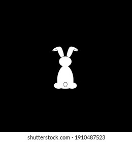 Silhouette of a cute rabbit. Easter holiday. Rabbit from the back. Isolated vector illustration. Christmas. Close-up. Isolated background. Black and white color.