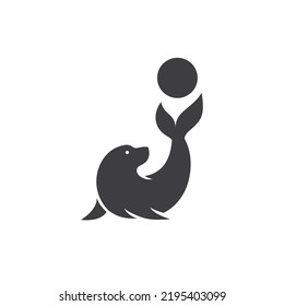 Silhouette of cute seals playing ball. Circus cartoon icon illustration.