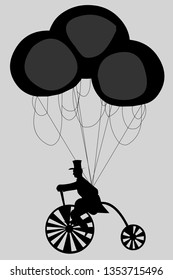 Silhouette of a cyclist with balloons