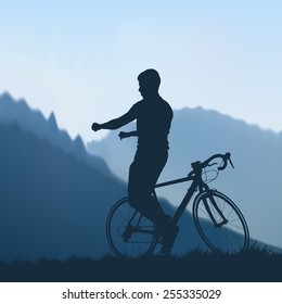 Silhouette of a cyclist improper in the mountains
