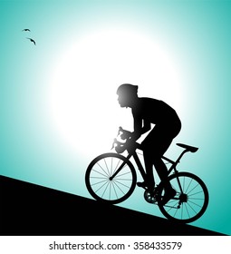 Silhouette Of Cyclist Pedaling Uphill