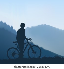 Silhouette of cyclists in the mountains