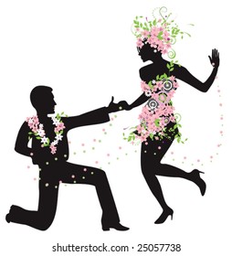 Silhouette of dancing couple with flowers