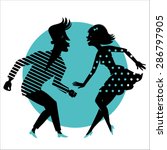 Silhouette of a dancing couple on a blue background.