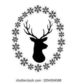 Silhouette of deer head and antlers and snowflake frame. Christmas reindeer. Vector illustration. Isolated on white background.