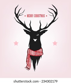 Silhouette of a deer with a scarf around his neck. Winter greeting card