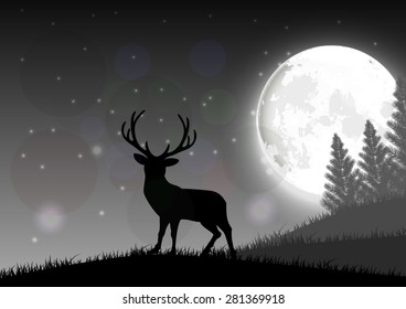 Silhouette of a deer standing on a hill at night with moon